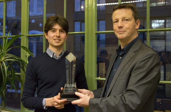 Harry Page Photo Competition 2013: Tim Page awarding the trophy to winner Laurence Mackman